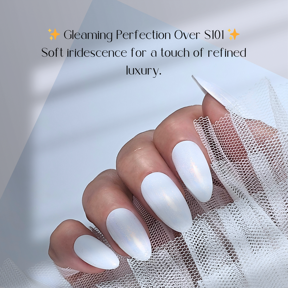 A hand with almond-shaped white nails, coated with White Diamond Nails SHIMMER TOP 02 over Gel Polish S101, creating a soft, iridescent shimmer. The subtle glow shifts under the light, enhancing the elegant and refined look. The fingers gently hold delicate white mesh fabric.