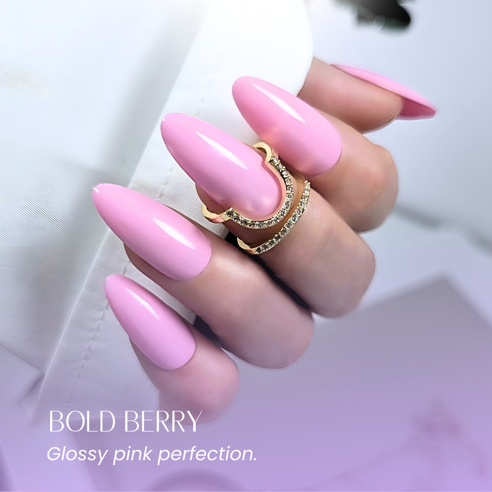 Bold Berry 132 applied on almond nails with gold accent ring