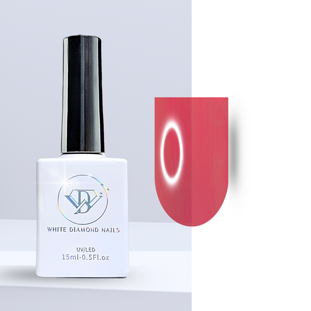 A bottle of White Diamond Nails gel polish in Confidence Is... Wearing Red, shade 201, featuring a sleek white design with a holographic logo. The polish displays a bold, translucent red hue with a glass-like finish, perfect for a striking and modern manicure, set against a clean background.