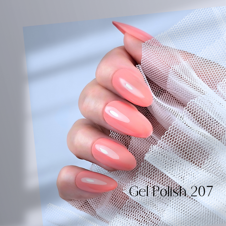 Four nails painted with White Diamond Nails gel polish in I Have a Crush on You, shade 207, arranged to highlight the delicate coral-pink color with a smooth, glossy finish, creating a soft and sophisticated look, set against a minimalist background.