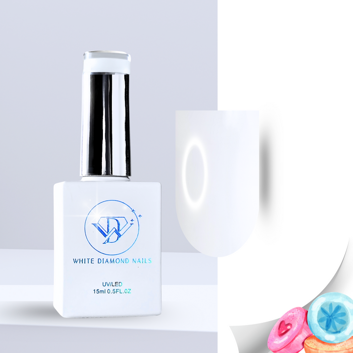 A bottle of White Diamond Nails Marshmallow Cloud color base gel, featuring a sleek white design with a chrome cap. The swatch displays a soft, milky white hue with a smooth, luminous finish. Pastel-colored candies in the corner emphasize its sweet, marshmallow-inspired scent.