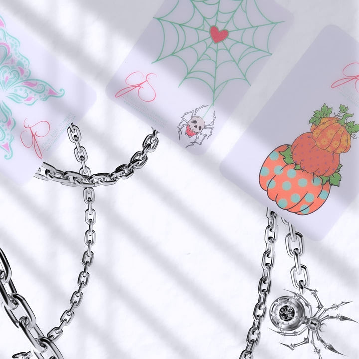 Three Clear Jelly Stamper scrapers featuring intricate designs: a butterfly, a Halloween spider, and a fall pumpkin, showcasing perfect tools for seasonal nail art.