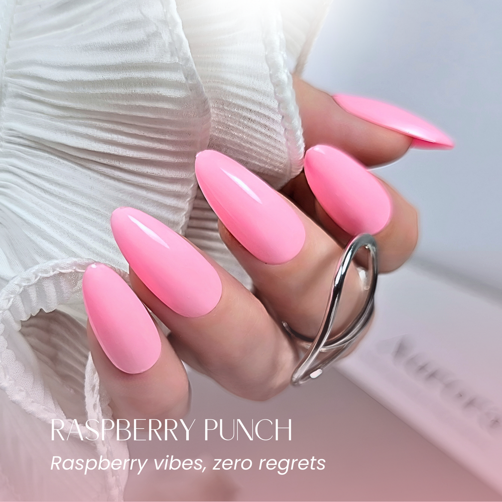 Raspberry Punch pink manicure with silver swirl ring