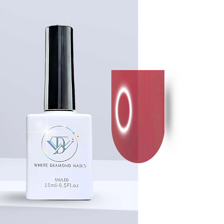 A bottle of White Diamond Nails gel polish in Old Flame, shade 202, featuring a sleek white design with a holographic logo. The polish showcases a warm, translucent red-orange hue with a glass-like finish, perfect for a bold and fiery manicure, set against a clean background.