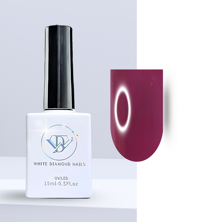 A bottle of White Diamond Nails gel polish in Mahogany Red, shade 209, featuring a sleek white design with a holographic logo. The polish showcases a deep, rich red hue with mahogany undertones and a creamy finish, perfect for a bold and sophisticated manicure, set against a clean background.